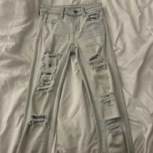 AMERICAN EAGLE WASHED RIPPED JEANS SIZE 00